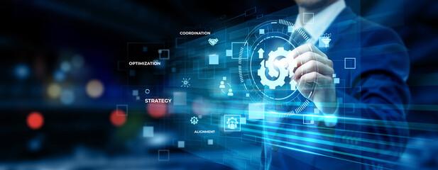 Fototapeta premium Businessman pointing at business integration technology on futuristic digital interface screen, enterprise system connectivity, digital transformation strategy, workflow automation