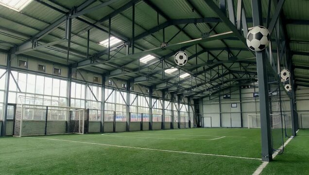 Architectural ultra high definition 4K stock video focusing on the framework of strong iron beams and structural elements utilized to reinforce the boundaries of an indoor soccer stadium illustrating