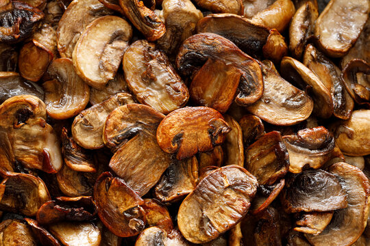 Fried sliced ​​mushrooms, close-up view. Mushroom background.
