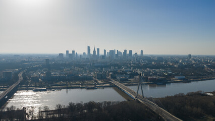 Naklejka premium Aerial Warsaw skyline with Vistula River and Swietokrzyski Bridge