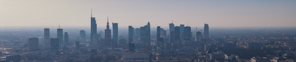 Aerial panorama of Warsaw skyline with Palace of Culture and Science © Earthly Shots