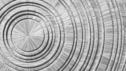 Wooden circle with a spiral pattern. circles arranged in way creates sense of depth and movement....