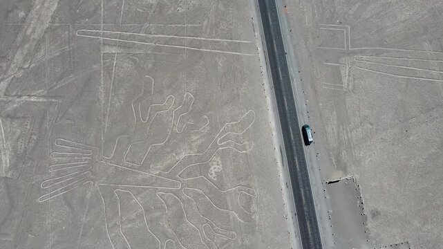 Aerial view of a camper van on the Nasca Lines