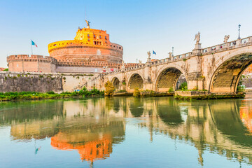 famous castle saint Angelo and bridge over Tiber in sunset light, Rome, Italy