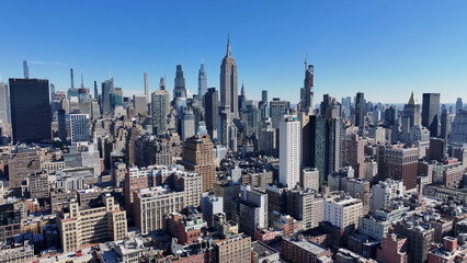 Obraz premium New York Skyline In Manhattan New York United States. Aerial View Of A High(Rise Buildings And Traffic Showcasing Urban Life. Business Sky Downtown Cityscape. Business Panning Wide.