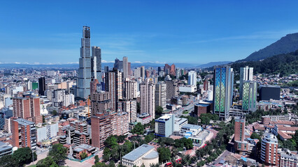Naklejka premium Bogota Skyline In Bogota Cundinamarca Colombia. Amazing Skysrapers And Traffic On Street Viewed From Above. Infrastructure Landscape Company Building Stunning. Infrastructure Urban.