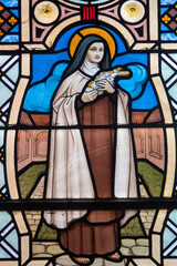 Stained glass (1916) of Saint Therese of Lisieux, Carmelite nun and Saint of the Roman Catholic Church.