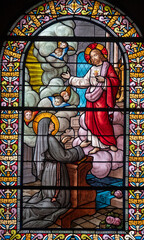 Stained glass (1916) of Vision of Sacred Heart of Jesus Christ to Saint Margaret Mary Alacoque.