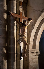 Roman statue (19th century) of Jesus Christ crucified on the cross.