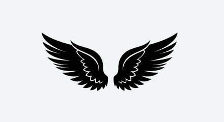 Obraz premium Black Angel Wings Silhouette on Gray Background