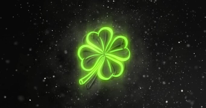 Specks appearing, four-leaf clover emblem being traced in neon green, pulsing halo to accent it
