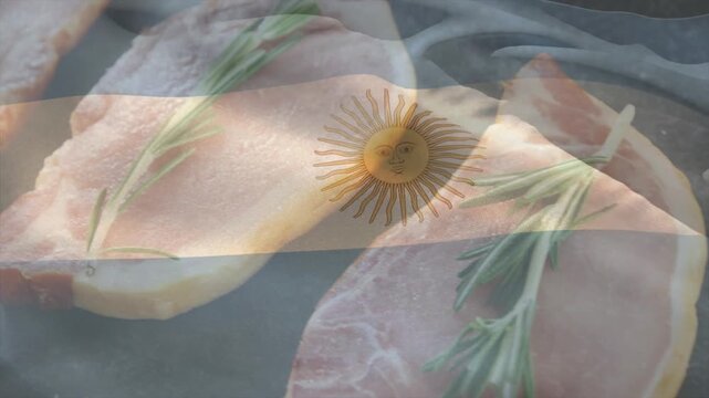 Argentina flag overlay lingering as hand entering, arranging raw pork chops and rosemary for baking