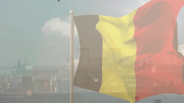 Moderate gust lifting Belgian tricolor flag, cloth billowing outward, sun glare revealing skyline