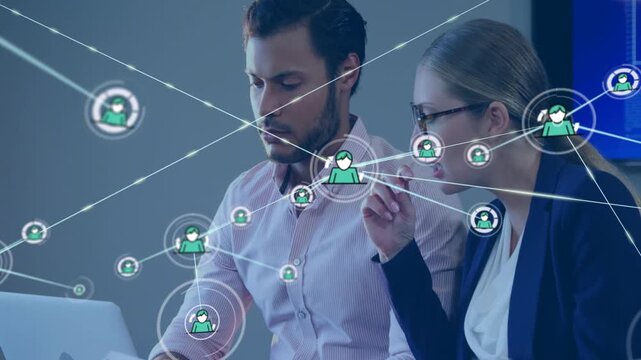 Two coworkers pointing while single user icon appearing over man, multiplying network for marketing