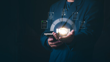 Obraz premium Concept of smart contract, digital signature, business partnership, successful deal, and online agreement, Businessman holding a glowing handshake with digital contract and document icons.