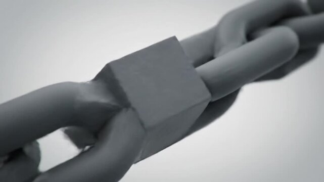Close-up of a broken chain against a bright background, abstract concept of failure