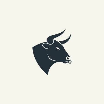 Stylized bull head silhouette with nose ring and powerful horns