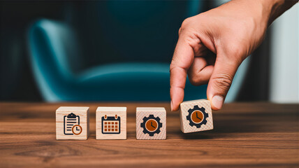 Business planning and strategy development visualized through wooden blocks with icons representing time, calendar, and gears in a modern office setting