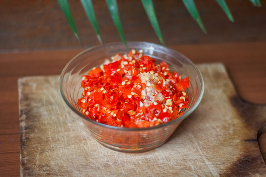 chopped red chili in transparent bowl.