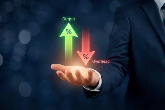 Businessman showing increase in output and decrease in overhead with digital arrows on open palm