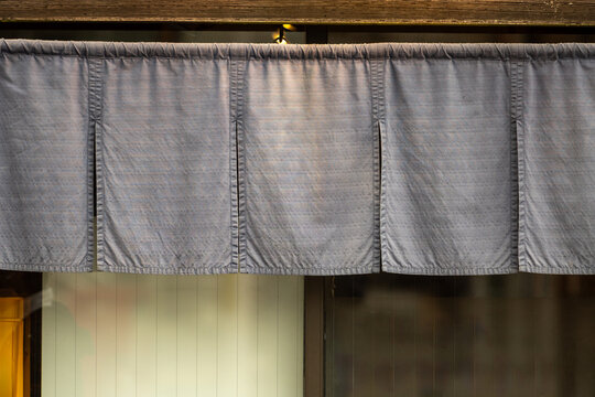 The curtain-like fabric that hangs in front of traditional Japanese restaurants and shops not only serves as a signboard, but holds a larger meaning,