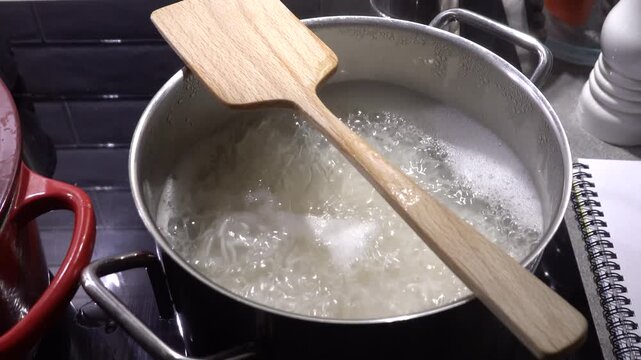 Stockholm, Sweden A wooden spoon is placed over boiling water, a cooking tip, to avoid boiling over. 