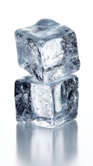 Obraz premium Two Ice Cubes Stacked on Reflective Surface with Glitter Detail in Studio Lighting