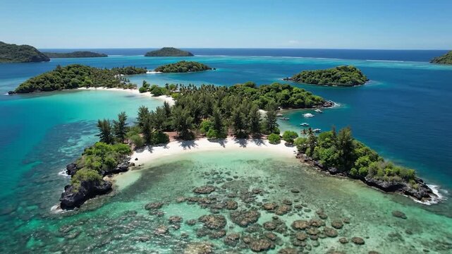 Tropical islands boast white sand beaches and clear blue water.