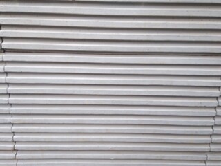 Obraz premium A striped gray cement wall texture. Can be used as a background or wallpaper. The wall surface texture is smooth.