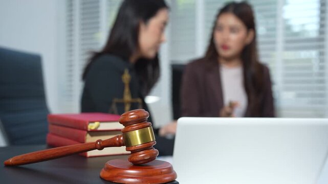 Lawyers and business professionals discuss contract papers at the office. legal and corporate consultation concept focusing on law, advice, and business agreements.