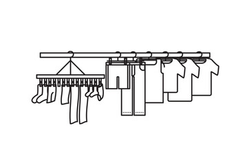 物干し竿にたくさんの洗濯物を干しているイラスト