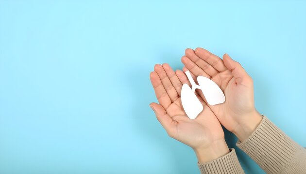 Human hands holding white lungs symbol, representing tuberculosis awareness, lung health, and tbc screening