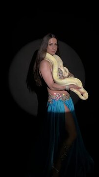 Graceful Woman with Albino Python Belly Dance Performance