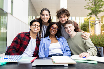 Fototapeta premium Happy multi-ethnic students smiling together at university campus
