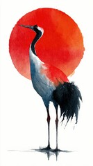 Fototapeta premium Japanese red crowned crane standing against rising sun