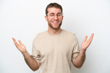 Fototapeta premium Young caucasian man isolated on white background smiling a lot