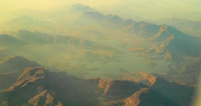 Lake Arthur, Maharashtra, India. Western Ghats, Sahyadris, is a mountain range that stretches 1,600 km along the western coast of the Indian peninsula. Covering an area of 160,000 km2 it traverses the