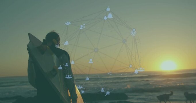 Sun nearing horizon as man carrying board walking shore, tech nodes aligning near man, dogs running