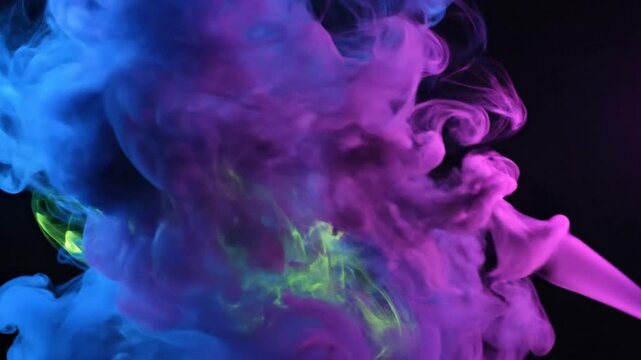 Abstract cloud of vibrant neon colors exploding against a dark background, dynamic artistic motion