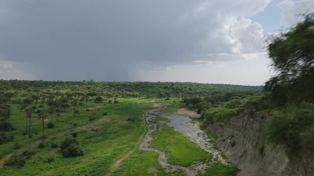 Drone shot of Tarangire National Park slowly panning over the landscape during green season