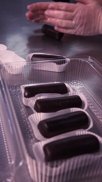 We form chocolate brownies. Vertical video