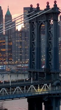 Brooklyn Bridge At Manhattan In New York United States. Highrise Buildings Landscape. Colorful Sunset. Brooklyn Bridge At New York United States. Stunning Cityscape. 