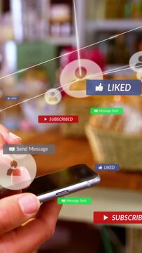 Vertical video: Hand entering frame, phone tapping, swiping, floating likes popping to share pastry