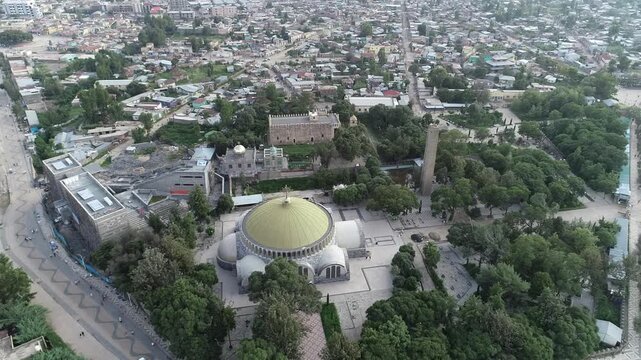Aerial Trucking Shot of the New and Old St. Mary of Zion Churches in Axum, Tigray, Ethiopia