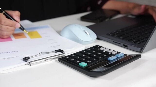 Workers analyzing and checking financial statement data. Financial data analysis and performance report statistics, Audit.