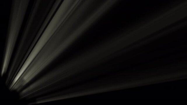 4K Looping Light Rays Overlay on Black Background for Screen Blending