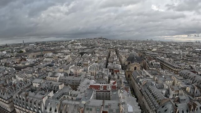 Aerial view of Paris skyline, cloudy day, cityscape panorama