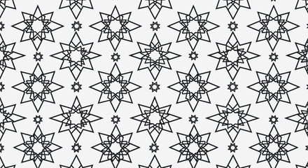 Obraz premium Geometric pattern featuring stars and floral illustrations in a seamless design viewed from directly above