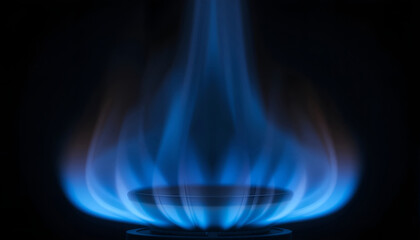Blue flame burning from a gas stove burner against a dark background, showcasing the vibrant colors and patterns of the flame in a close-up view