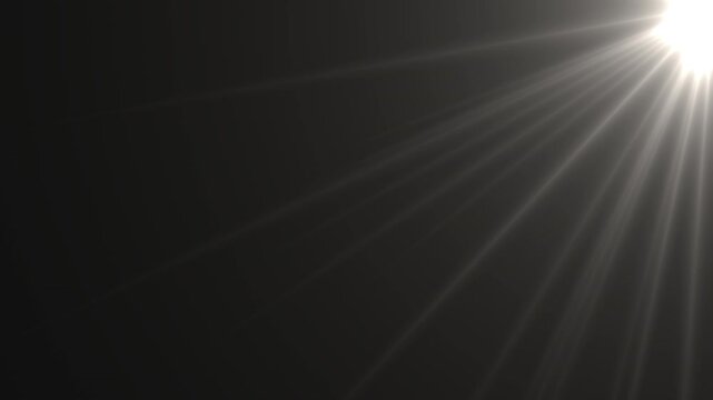 Bright Rotating Light Flare with Long Volumetric Rays with Black Background. Use add or screen modes to remove background and overlay on your videos.